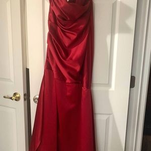 Worn once at a wedding-the pink strap has been removed